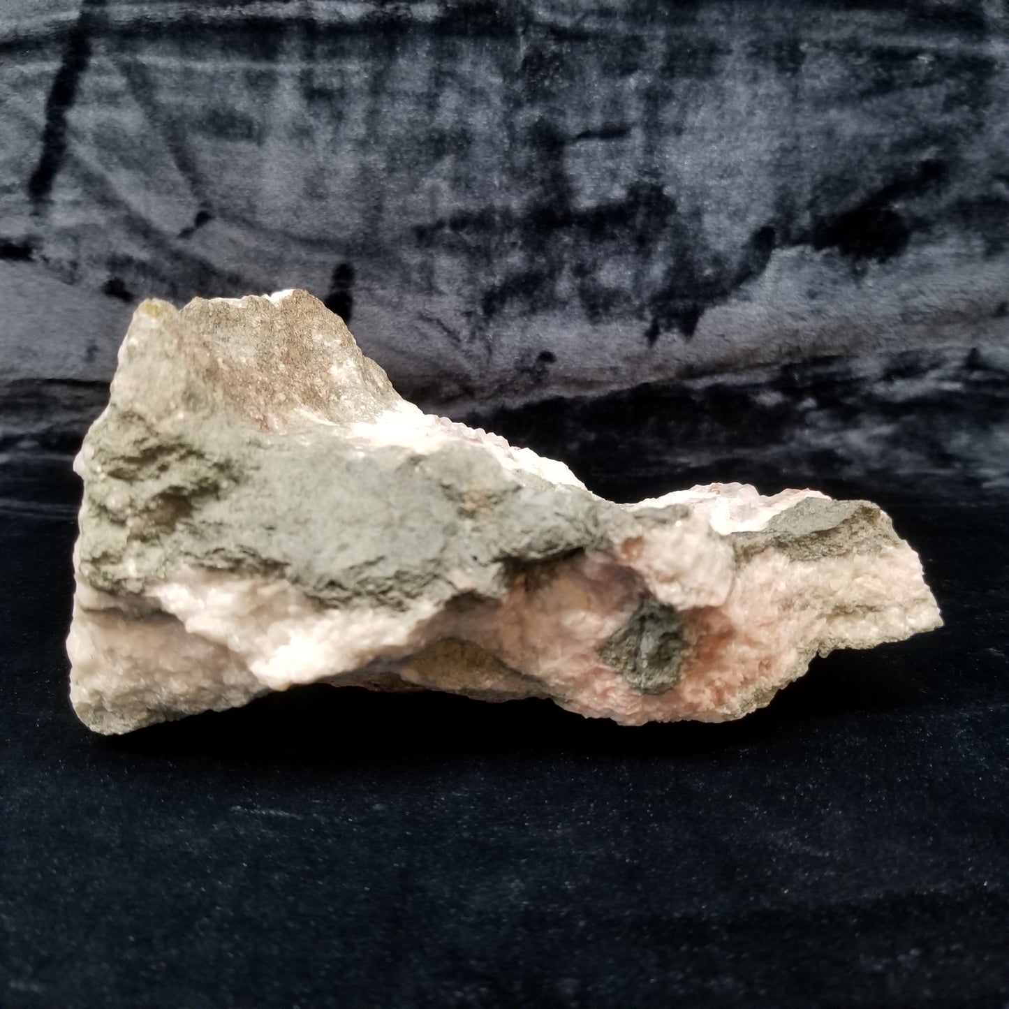 #11299 Chalcopyrite on clear Combined form Calcite with Hematite inclusions