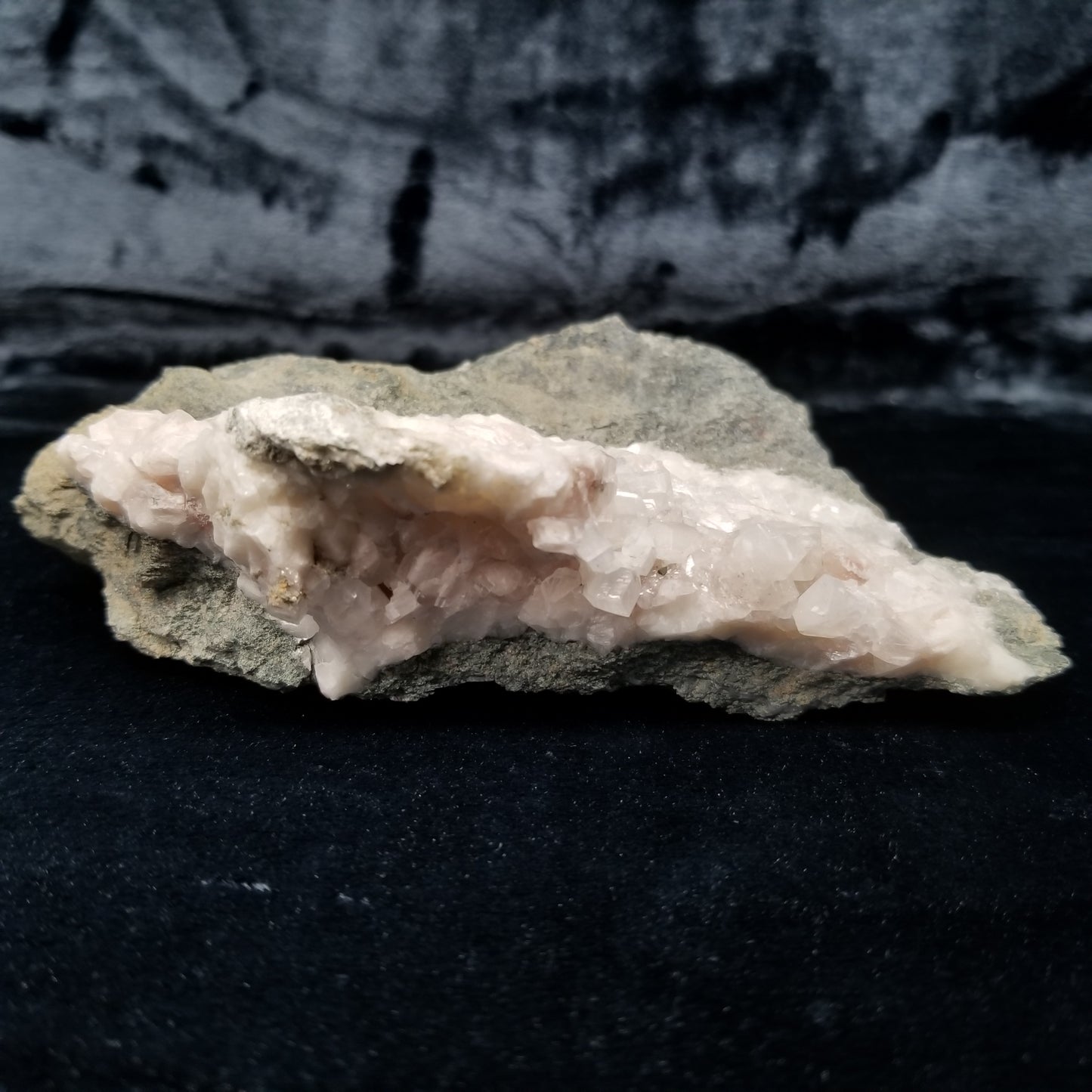 #11303 Chalcopyrite on clear Combined form Calcite with Hematite inclusions on matrix