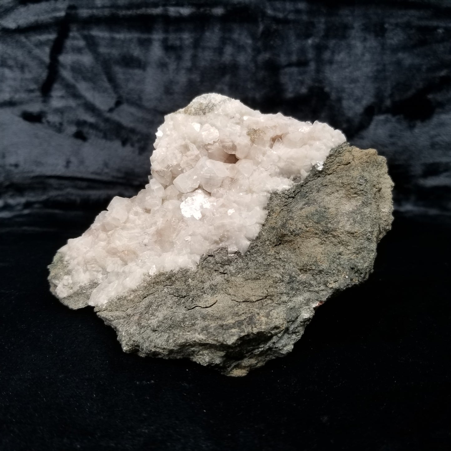 #11303 Chalcopyrite on clear Combined form Calcite with Hematite inclusions on matrix