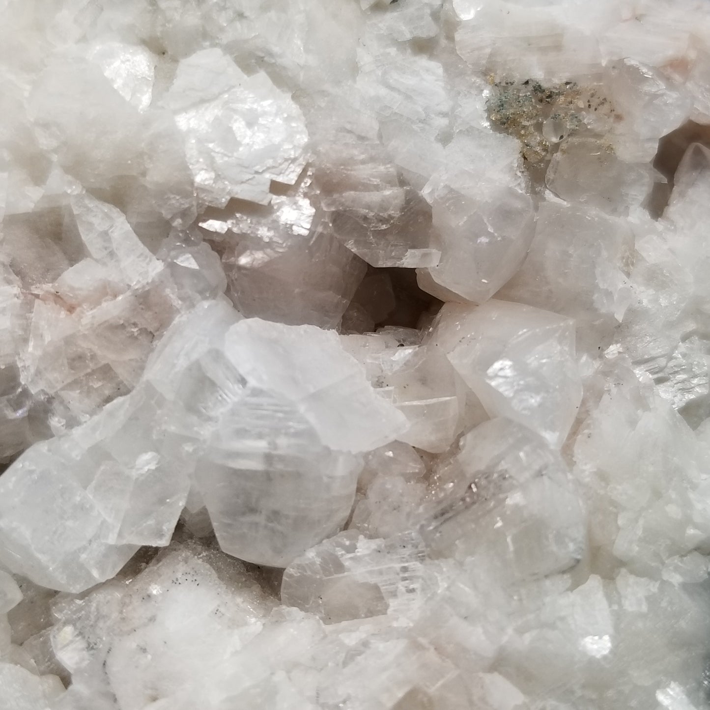 #11303 Chalcopyrite on clear Combined form Calcite with Hematite inclusions on matrix