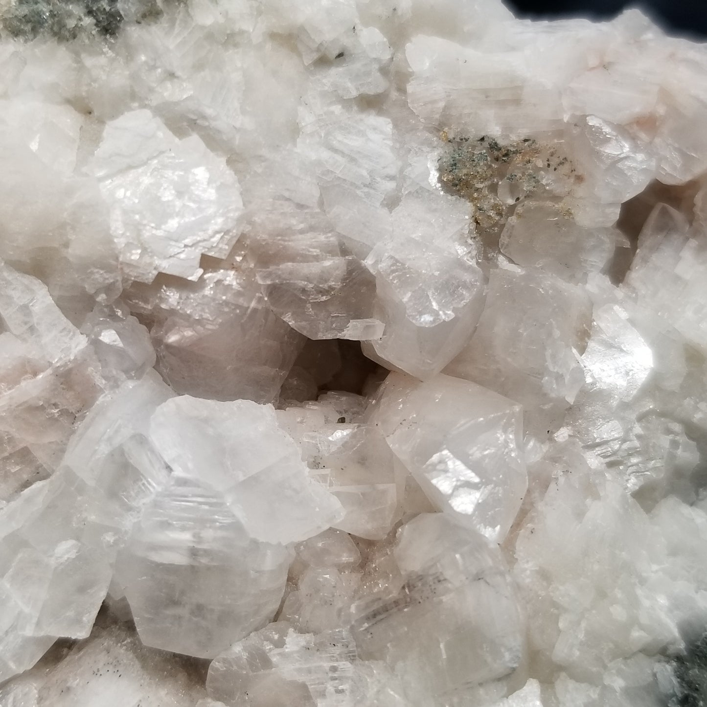 #11303 Chalcopyrite on clear Combined form Calcite with Hematite inclusions on matrix