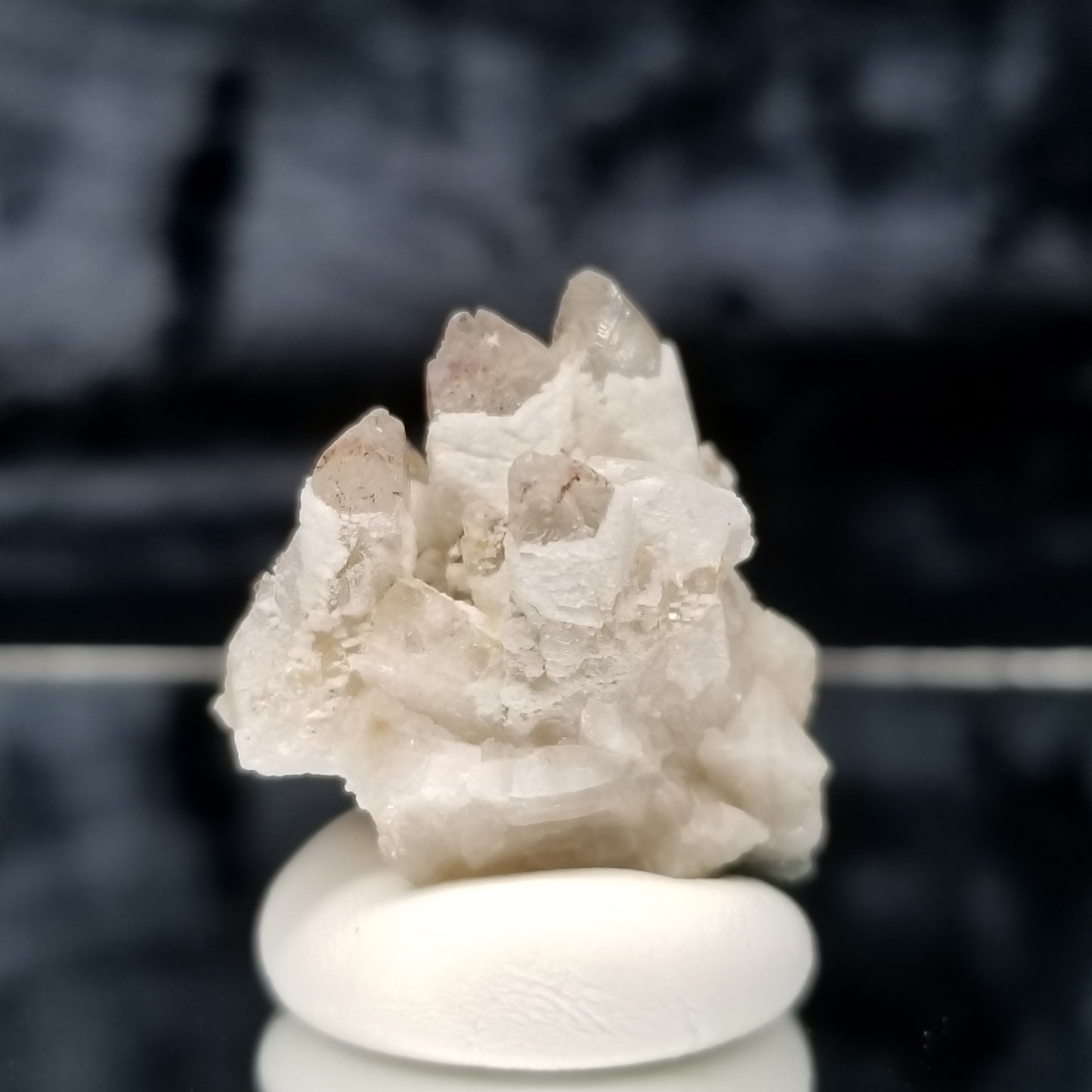 #11348 White Dolomite and Chalcopyrite on clear Combined form Calcite cluster with Hematite inclusions on matrix