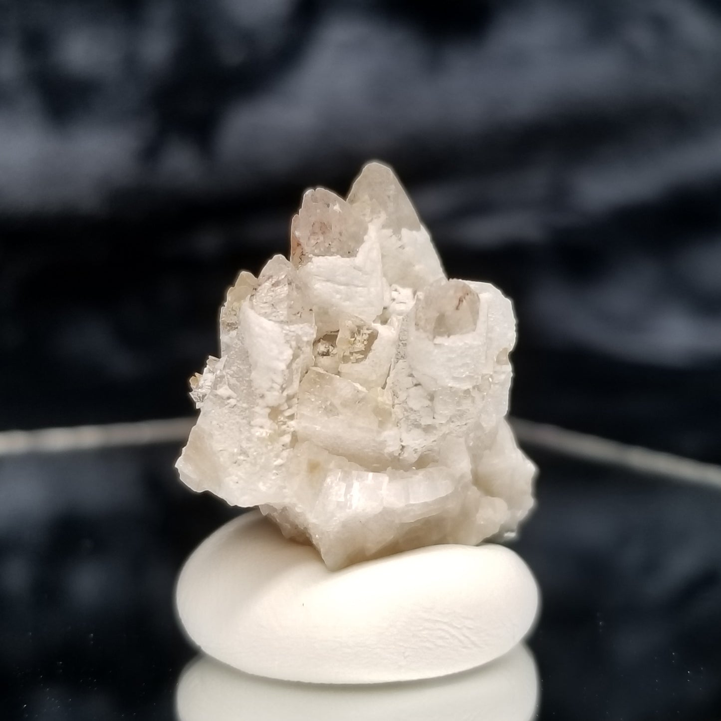 #11348 White Dolomite and Chalcopyrite on clear Combined form Calcite cluster with Hematite inclusions on matrix