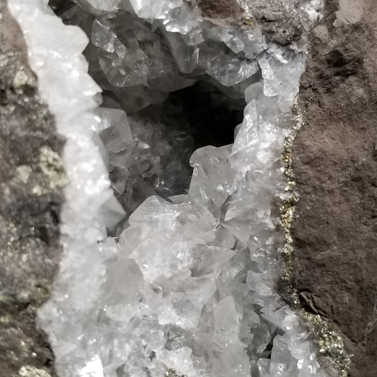 #33008 Super clear Nailhead Spar Calcite geode, Chalcopyrite ore and multiple small fossils in the matrix