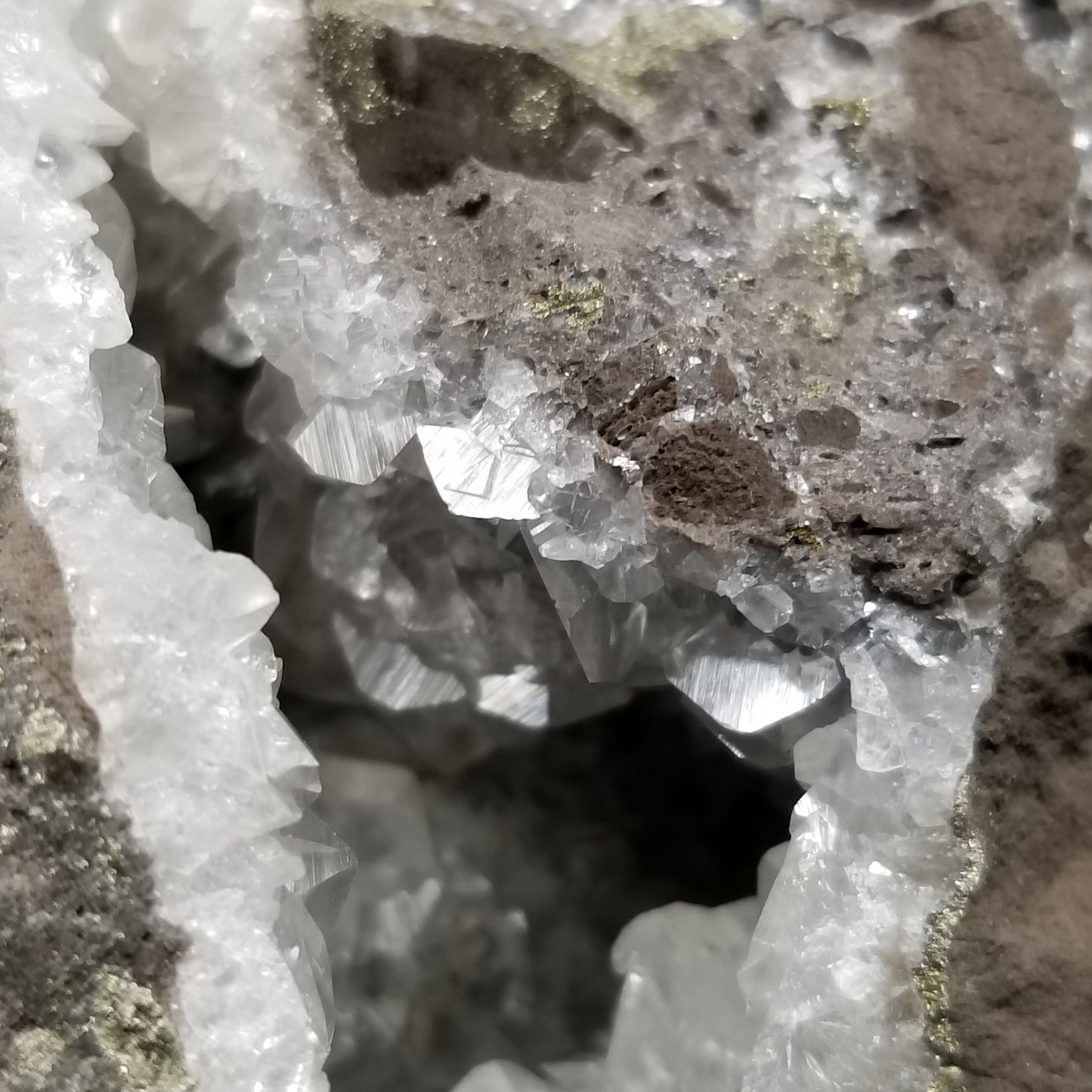 #33008 Super clear Nailhead Spar Calcite geode, Chalcopyrite ore and multiple small fossils in the matrix