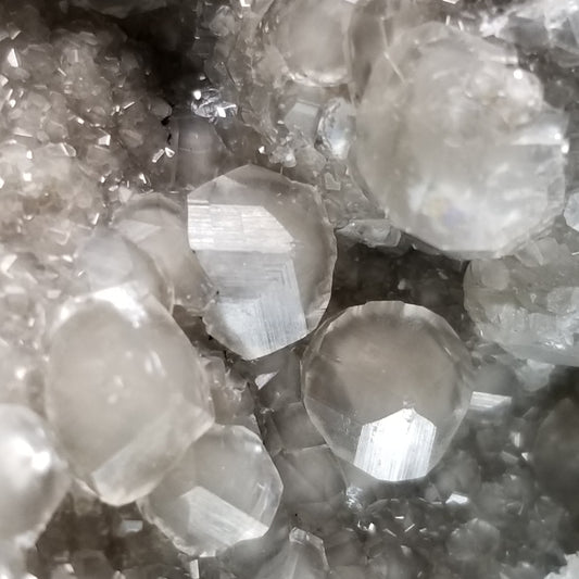 #33014 Super clear Nailhead Spar Calcite geode, Chalcopyrite ore and multiple small fossils in the matrix
