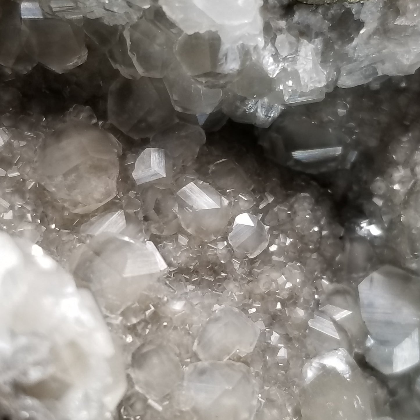 #33014 Super clear Nailhead Spar Calcite geode, Chalcopyrite ore and multiple small fossils in the matrix