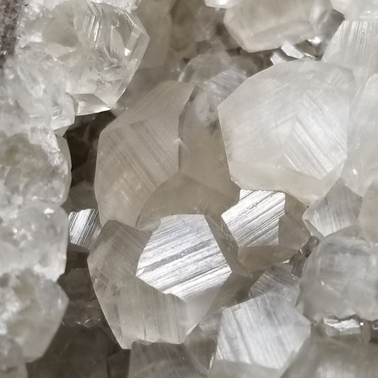 #33018 Super clear Nailhead Spar Calcite cluster, Chalcopyrite ore and multiple small fossils in the matrix