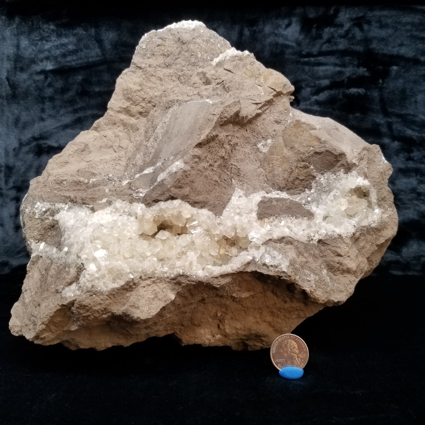 #33021 Super clear Nailhead Spar Calcite geode, Chalcopyrite ore and multiple small fossils in the matrix