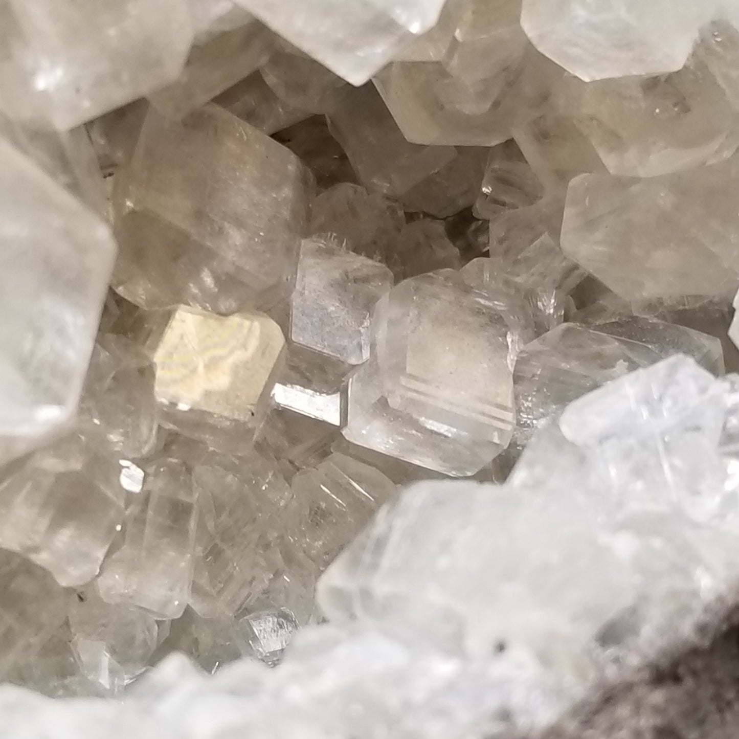 #33021 Super clear Nailhead Spar Calcite geode, Chalcopyrite ore and multiple small fossils in the matrix