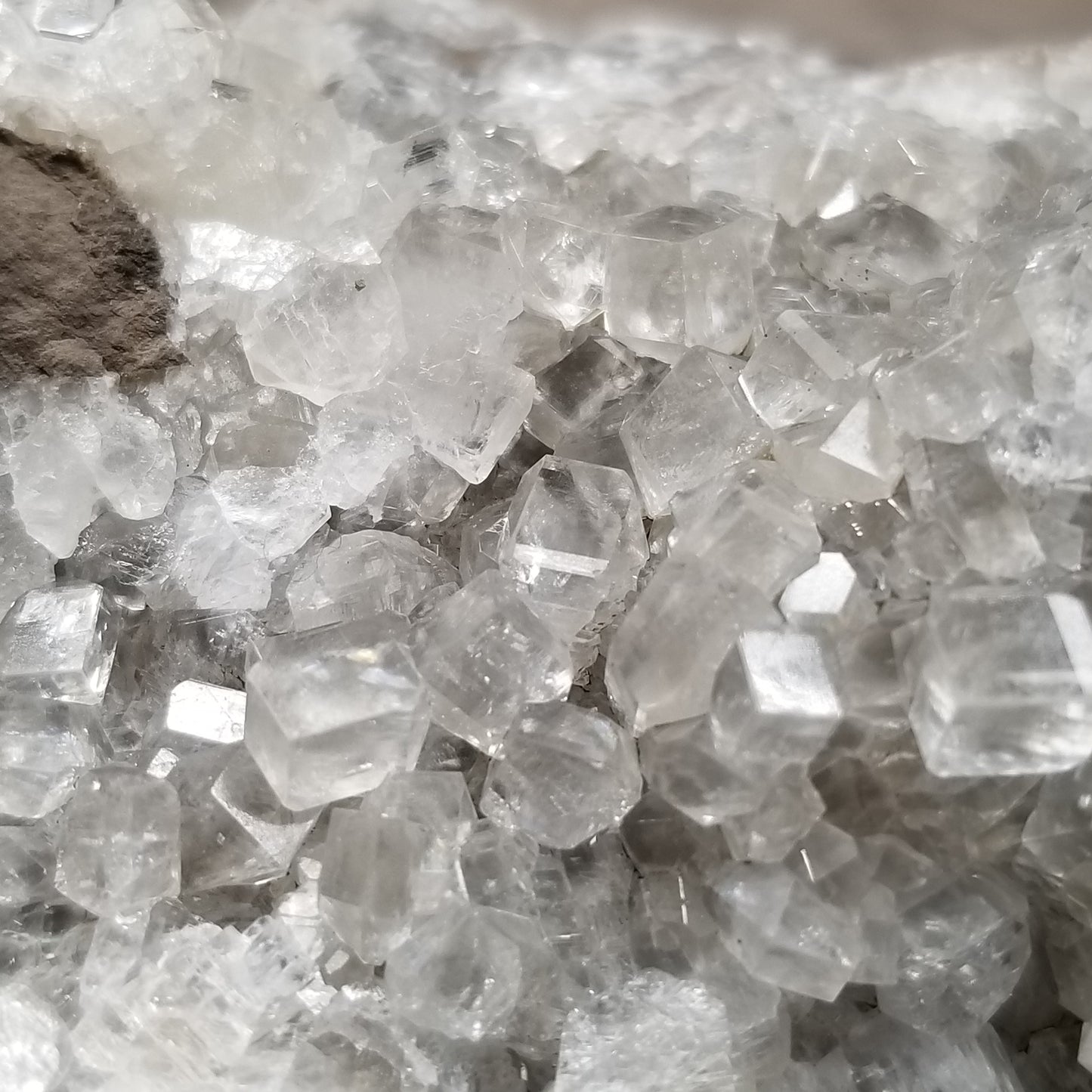 #33024 Super clear Nailhead Spar Calcite geode, Chalcopyrite ore and multiple small fossils in the matrix