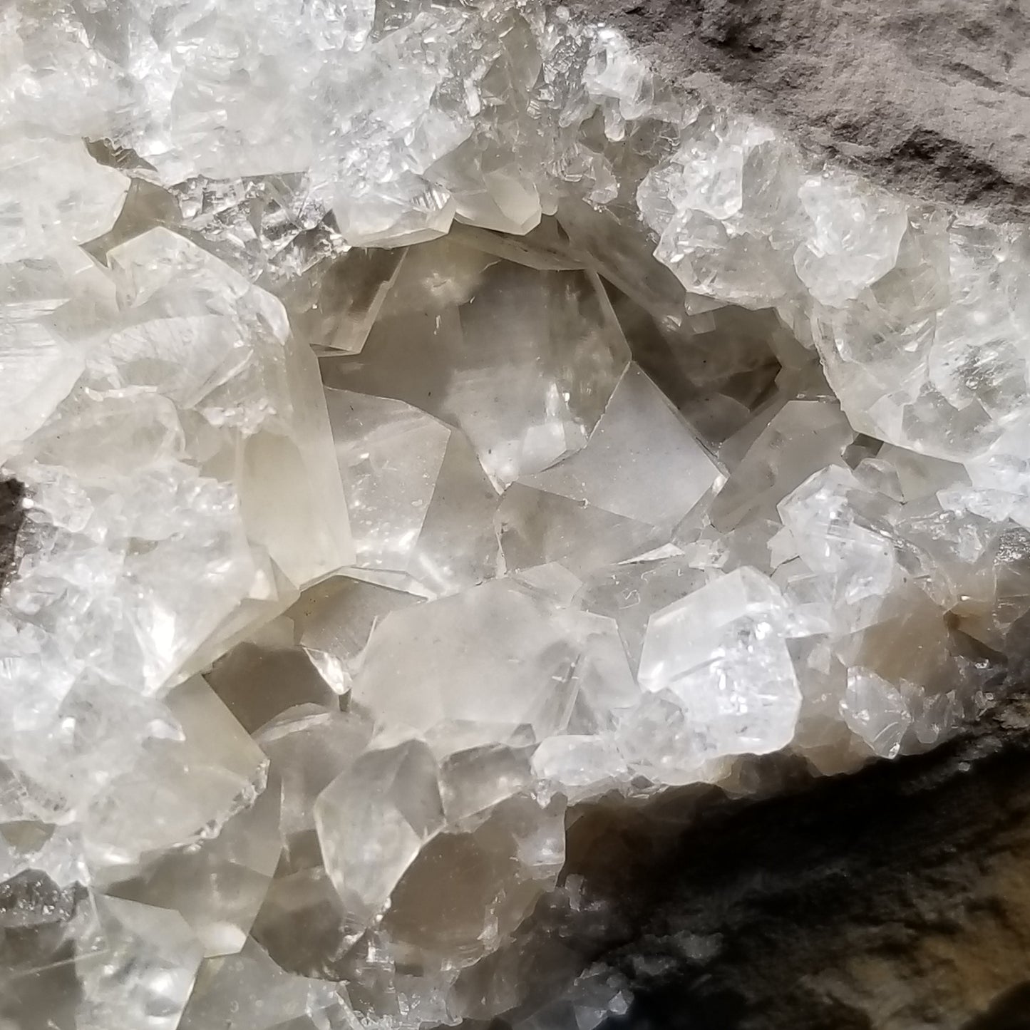 #33024 Super clear Nailhead Spar Calcite geode, Chalcopyrite ore and multiple small fossils in the matrix