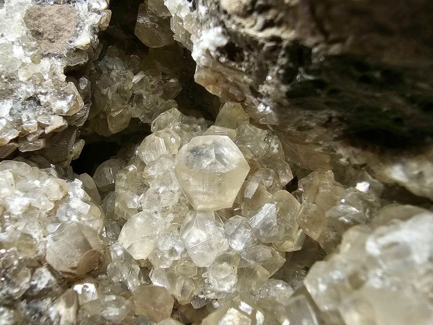 #33026 Super clear Nailhead Spar Calcite geode, Chalcopyrite ore and multiple small fossils in the matrix