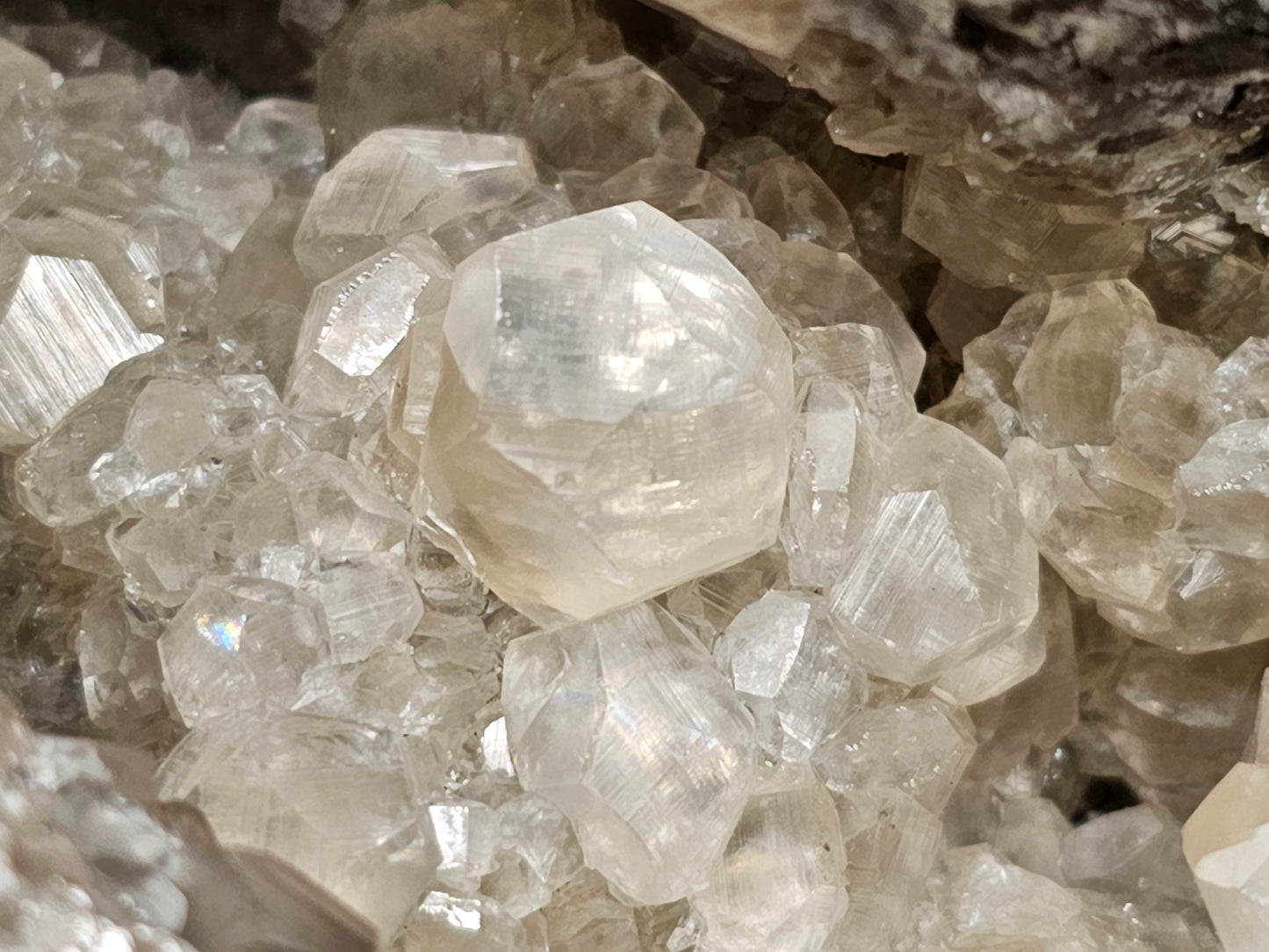 #33026 Super clear Nailhead Spar Calcite geode, Chalcopyrite ore and multiple small fossils in the matrix