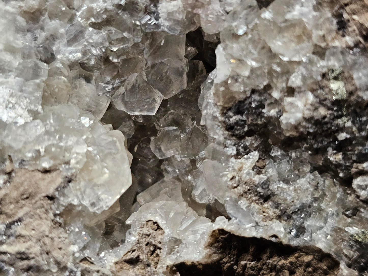#33026 Super clear Nailhead Spar Calcite geode, Chalcopyrite ore and multiple small fossils in the matrix
