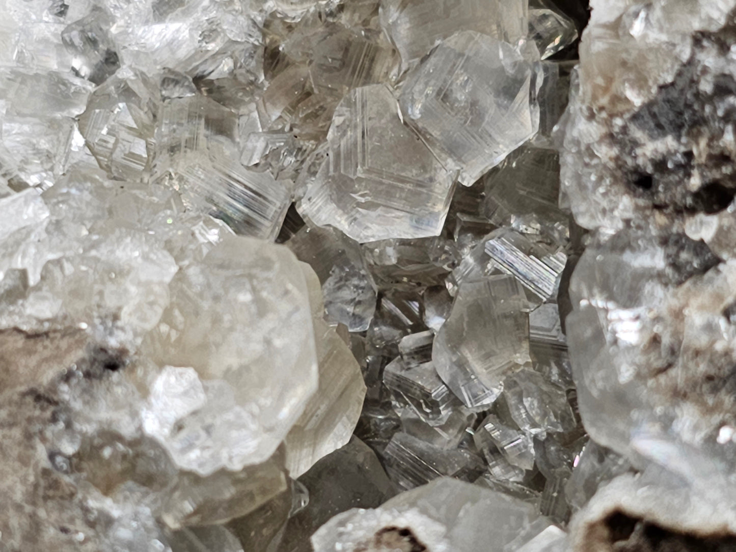 #33026 Super clear Nailhead Spar Calcite geode, Chalcopyrite ore and multiple small fossils in the matrix