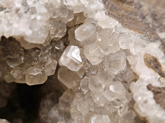 #33032 Super clear Nailhead Spar Calcite geode, Chalcopyrite ore and multiple small fossils in the matrix