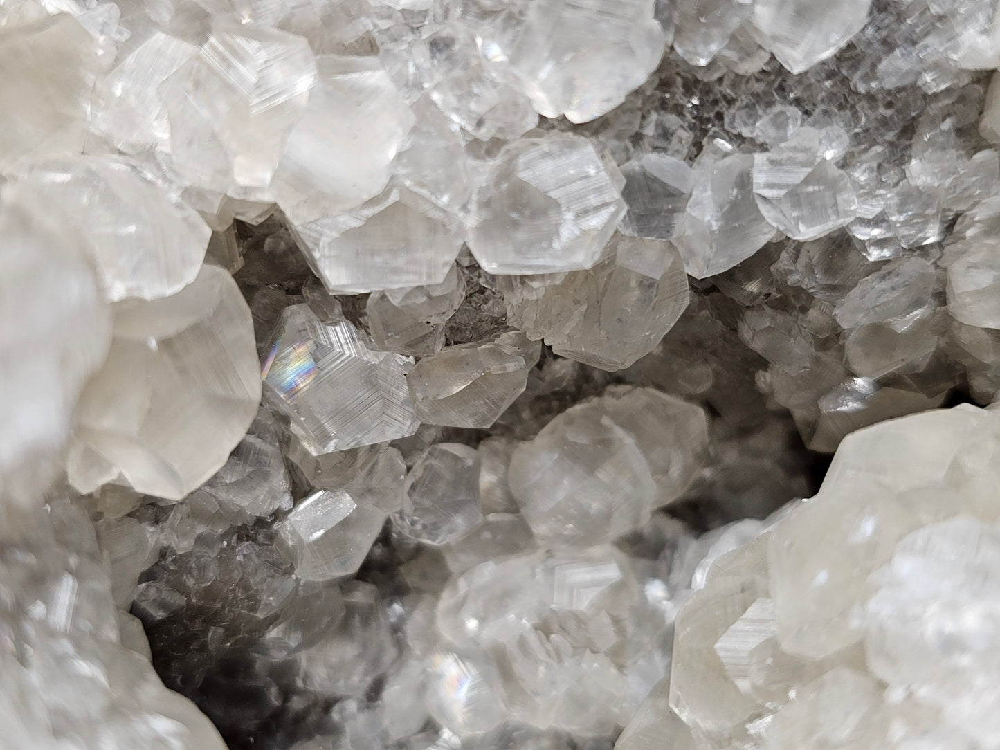 #33033 Super clear Nailhead Spar Calcite geode, Chalcopyrite ore and multiple small fossils in the matrix