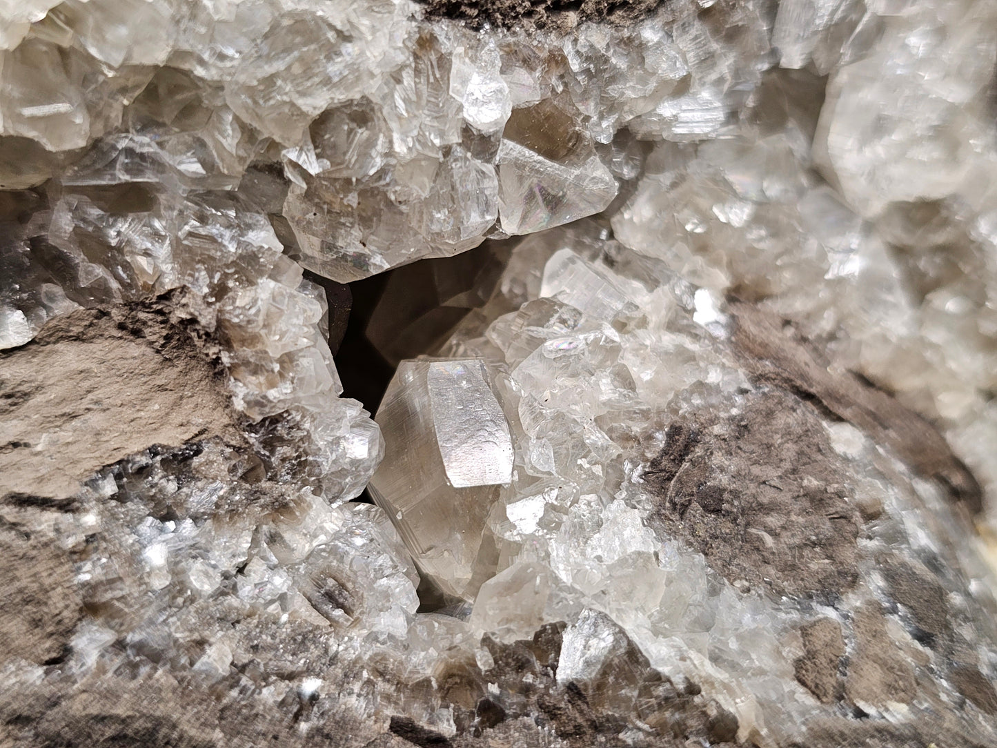 #33033 Super clear Nailhead Spar Calcite geode, Chalcopyrite ore and multiple small fossils in the matrix