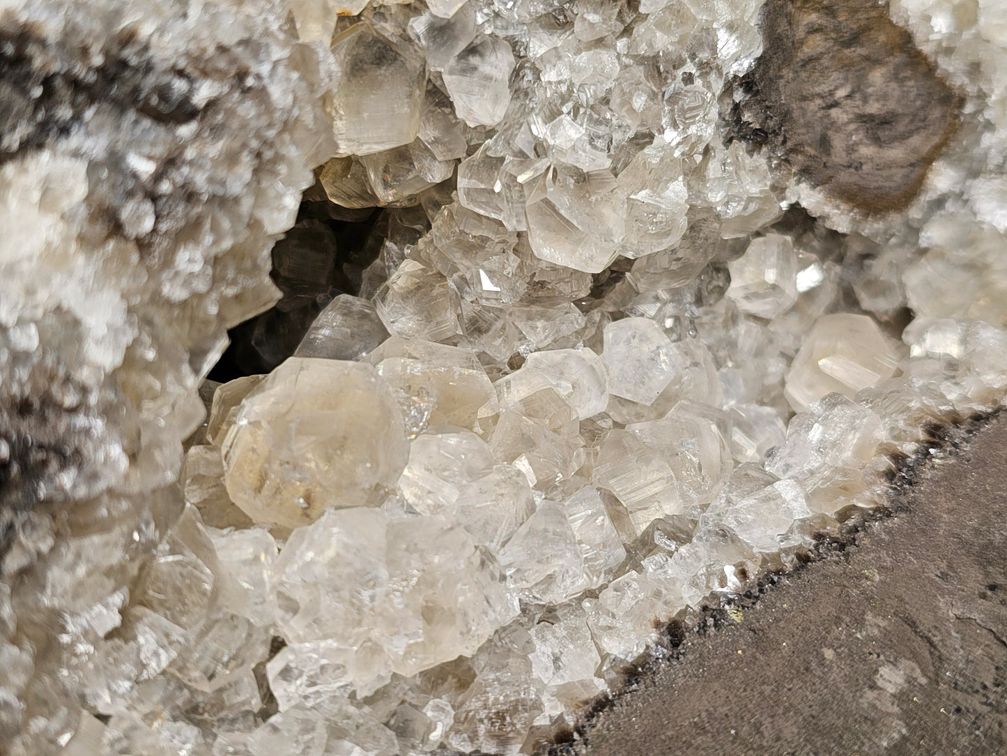 #33037 Super clear Nailhead Spar Calcite geode, Chalcopyrite ore and multiple small fossils in the matrix