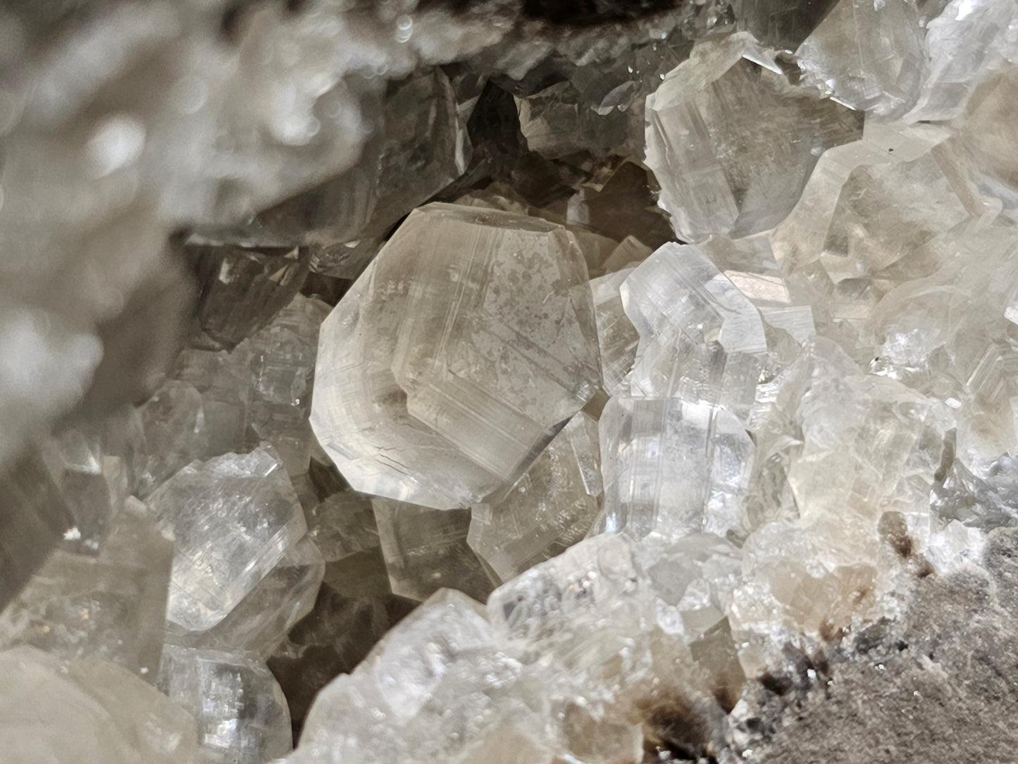 #33037 Super clear Nailhead Spar Calcite geode, Chalcopyrite ore and multiple small fossils in the matrix