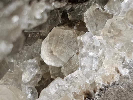 #33037 Super clear Nailhead Spar Calcite geode, Chalcopyrite ore and multiple small fossils in the matrix