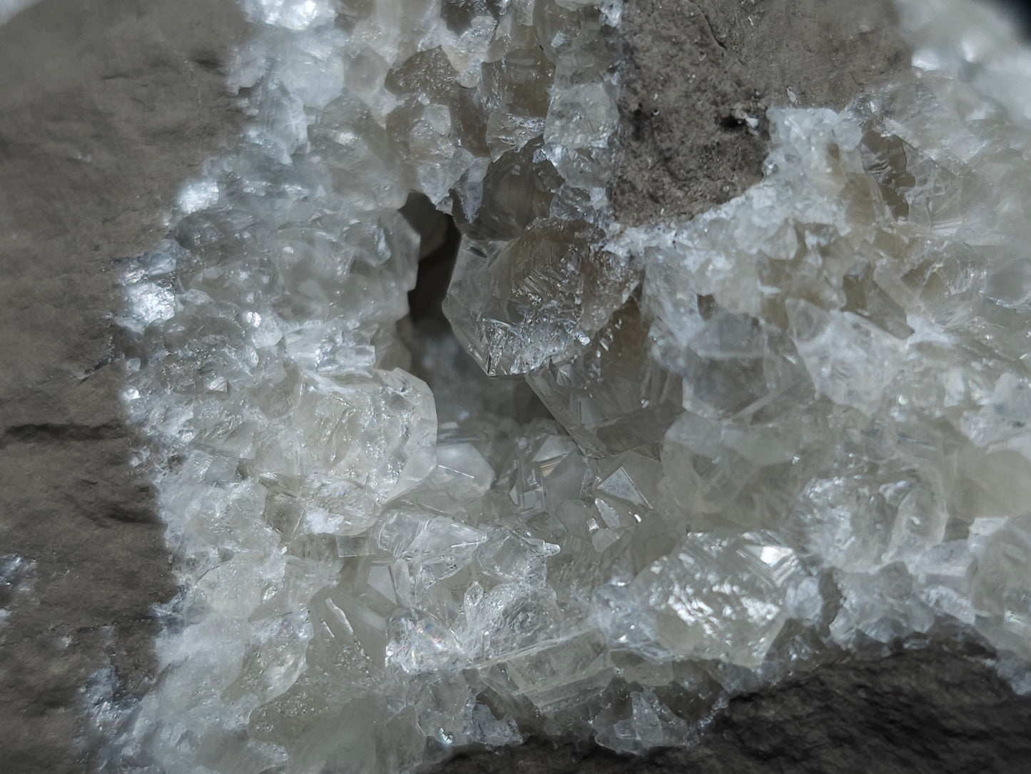#33090 Super clear Nailhead Spar Calcite geode, Chalcopyrite ore and multiple small fossils in the matrix