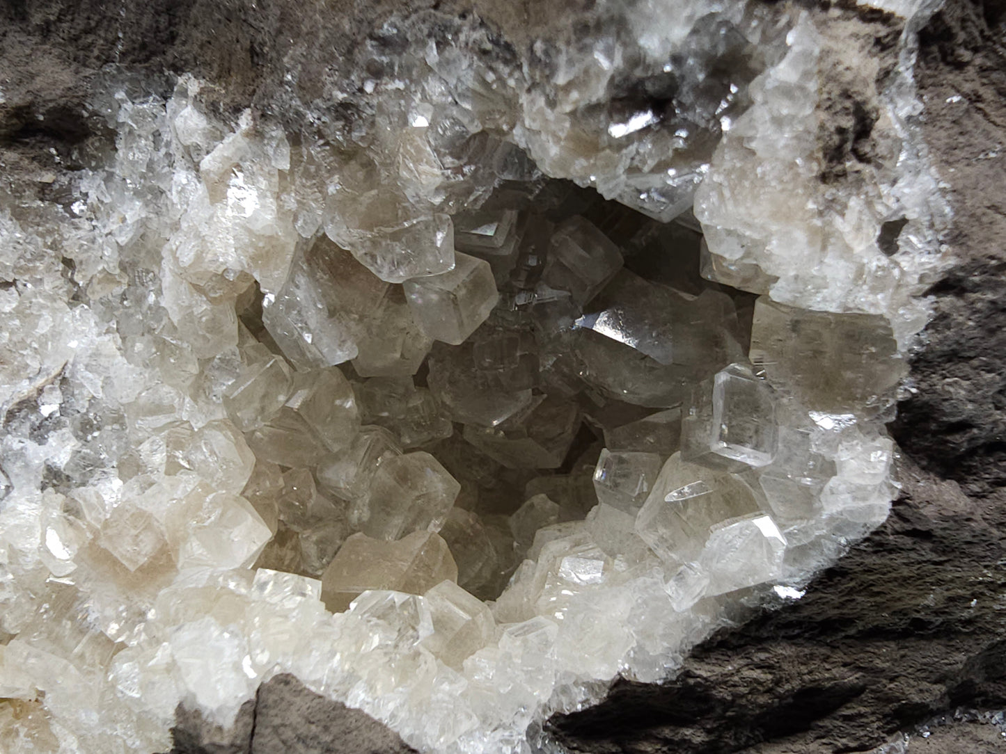 #33093 Super clear Nailhead Spar Calcite geode, Chalcopyrite ore and multiple small fossils in the matrix