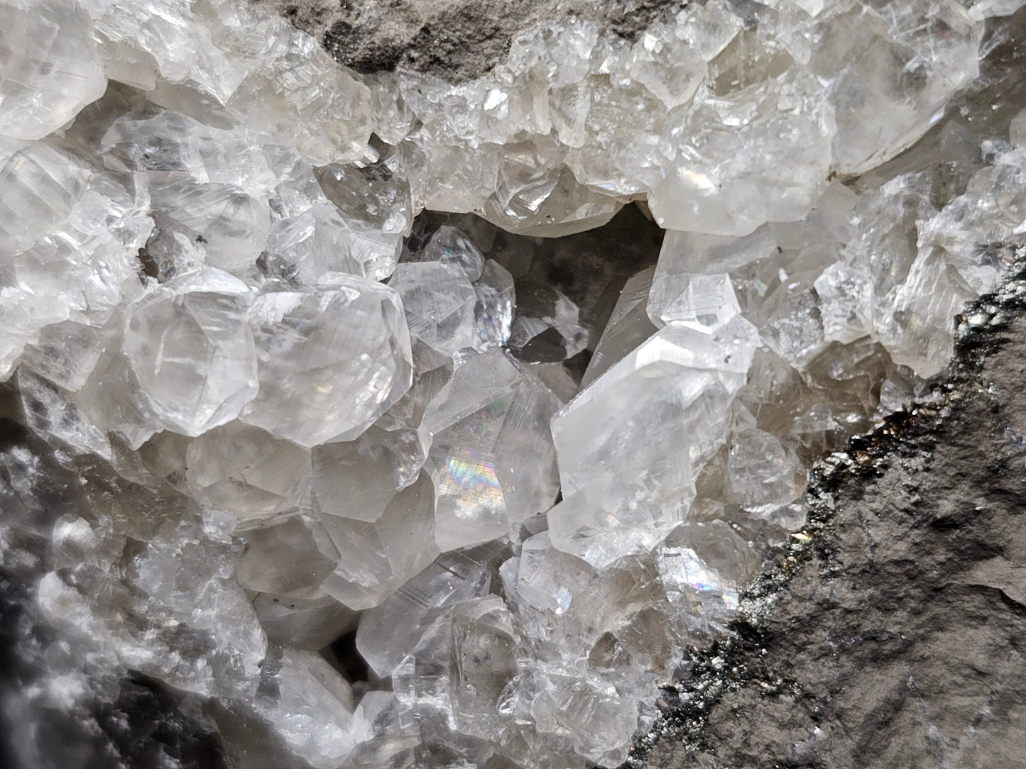 #33088 Super clear Nailhead Spar Calcite geode, Chalcopyrite ore and multiple small fossils in the matrix