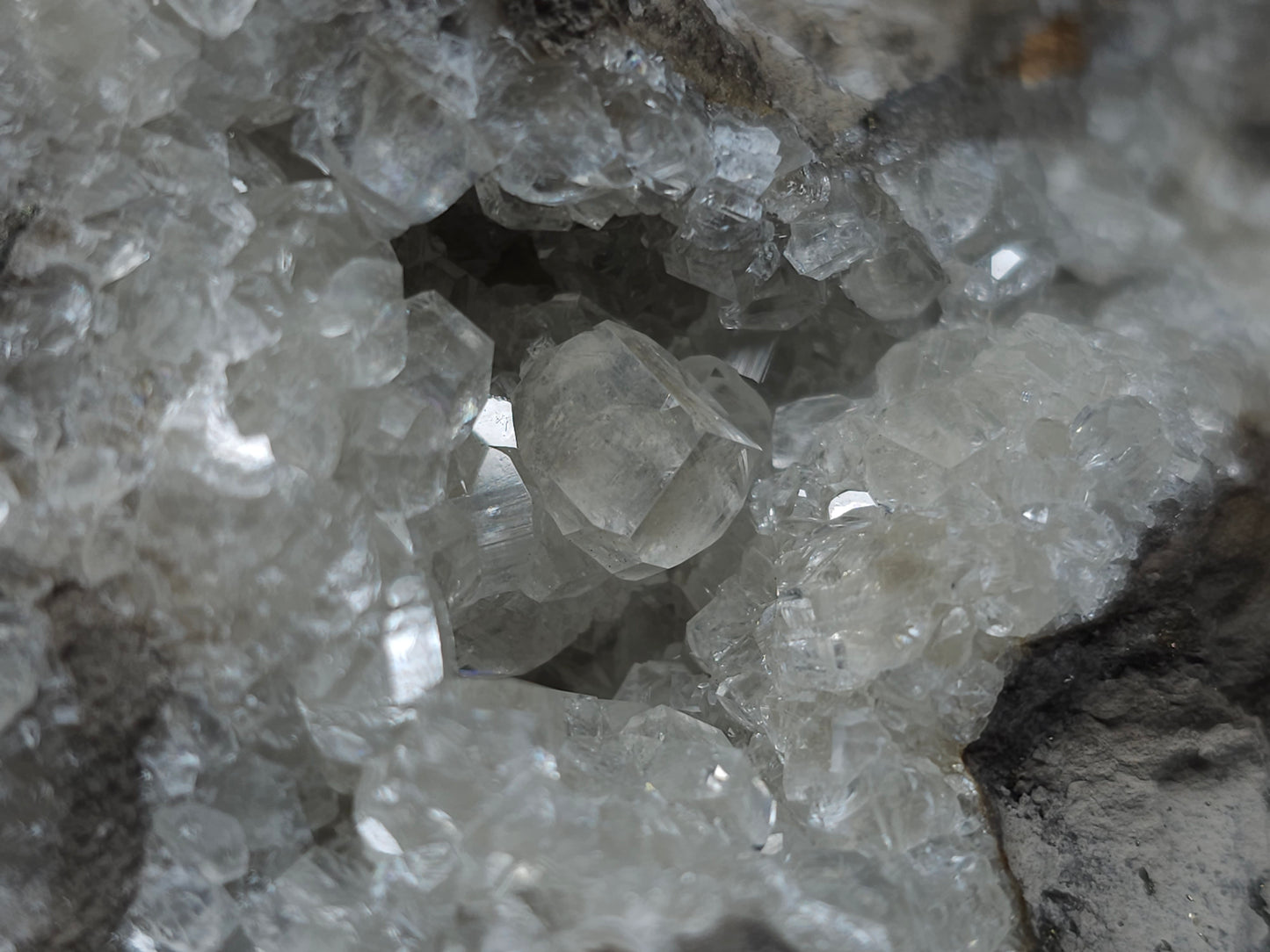 #33087 Super clear Nailhead Spar Calcite geode, Chalcopyrite ore and multiple small fossils in the matrix