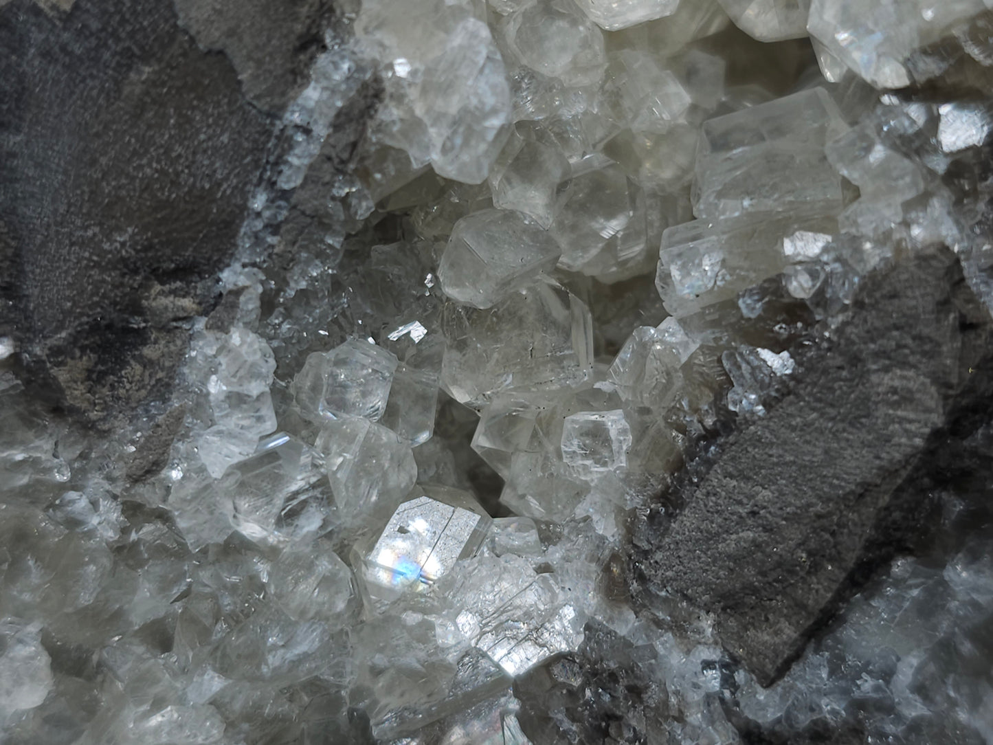 #33101 Super clear Nailhead Spar Calcite geode, Chalcopyrite ore and multiple small fossils in the matrix