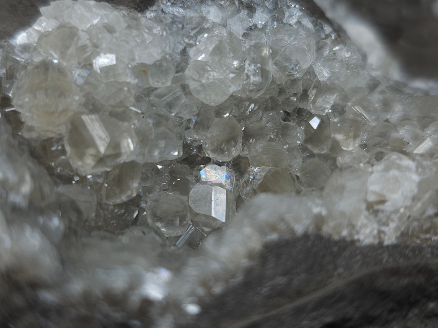 #33107 Super clear Nailhead Spar Calcite geode with Chalcopyrite ore and multiple small fossils in the matrix