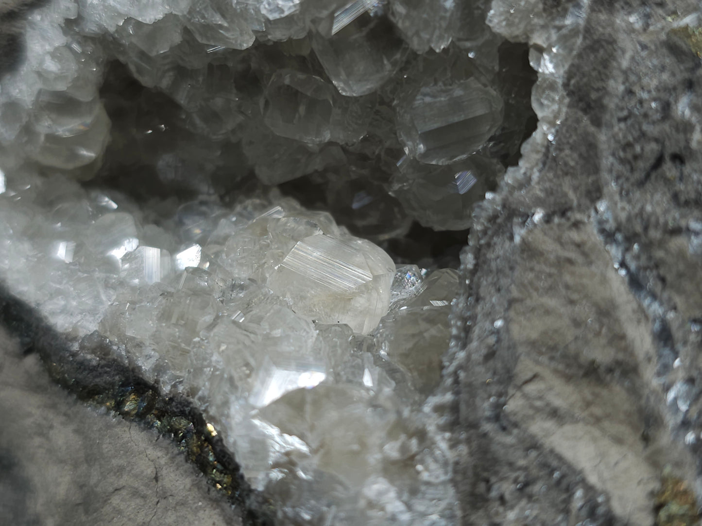 #33118 Super clear Nailhead Spar Calcite geode with Chalcopyrite ore and multiple small fossils in the matrix