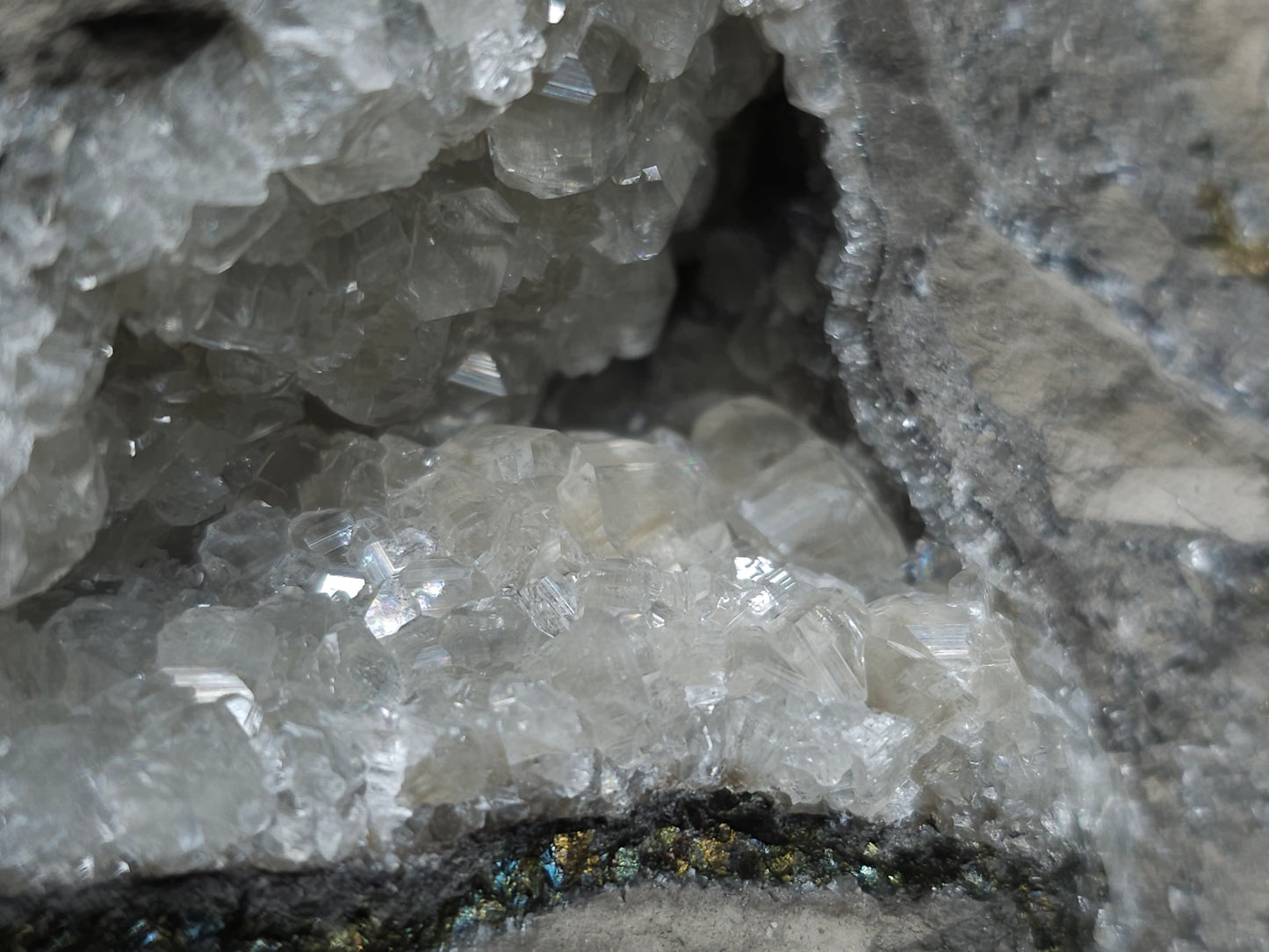 #33118 Super clear Nailhead Spar Calcite geode with Chalcopyrite ore and multiple small fossils in the matrix