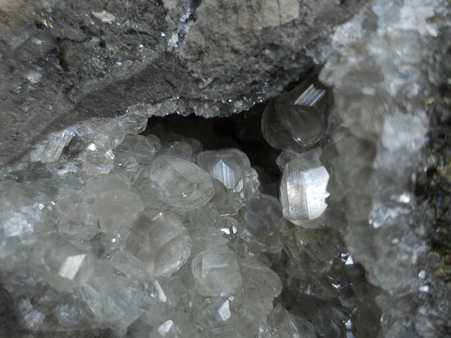 #33118 Super clear Nailhead Spar Calcite geode with Chalcopyrite ore and multiple small fossils in the matrix