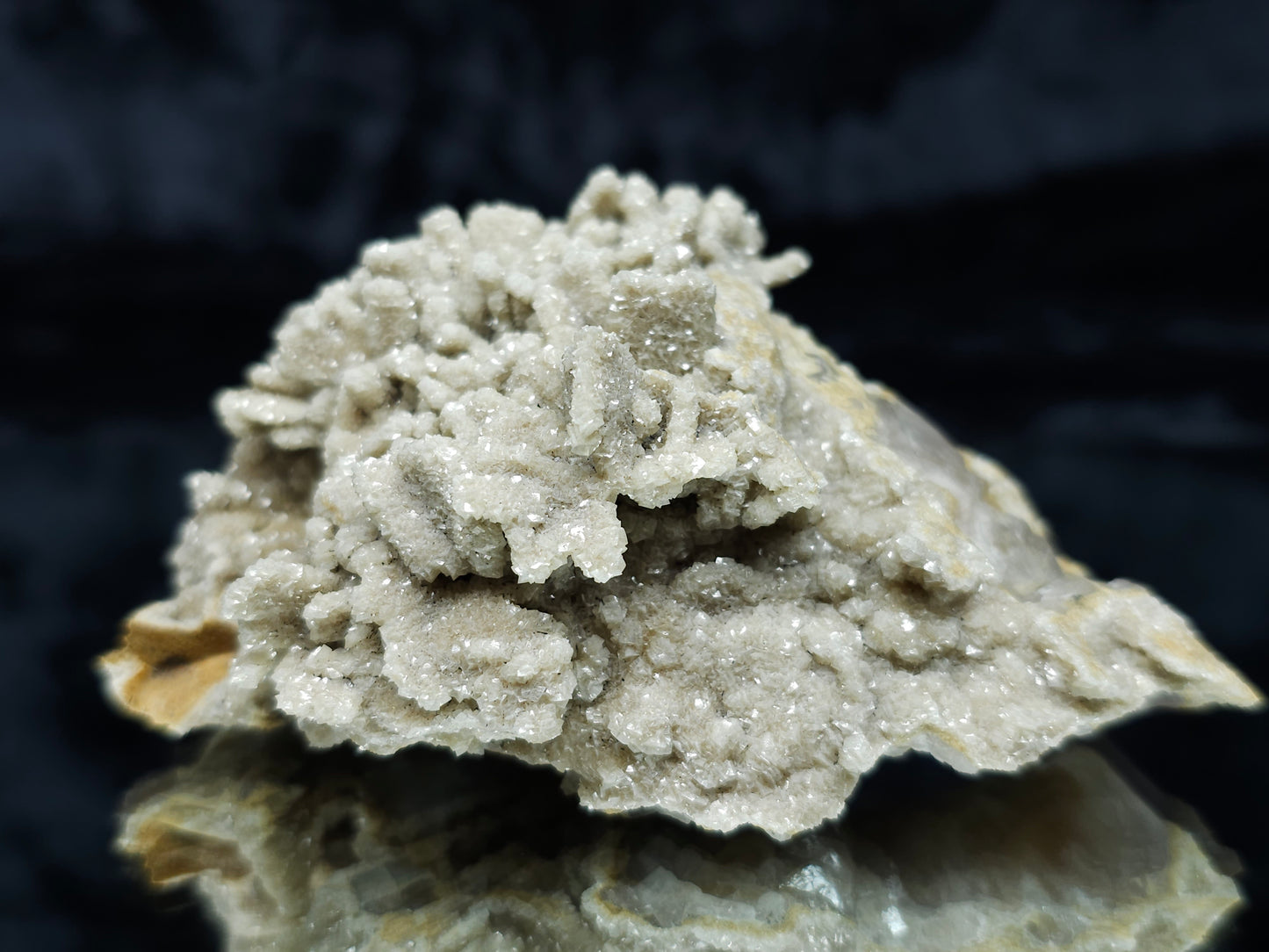 #88005 Cream-white Calcite pseudomorph after needle Calcite on matrix