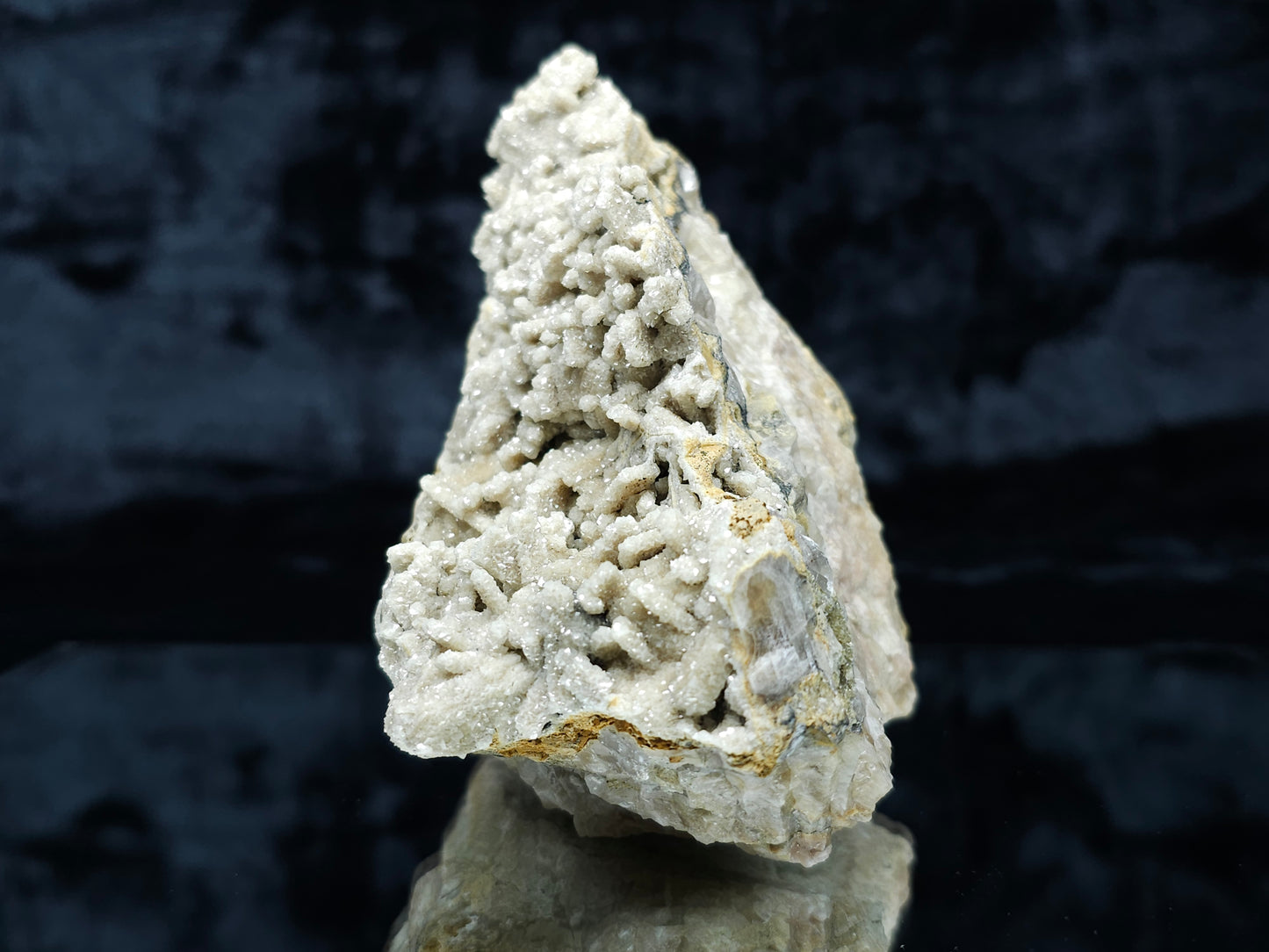 #88006 Cream-white Calcite pseudomorph after needle Calcite on matrix