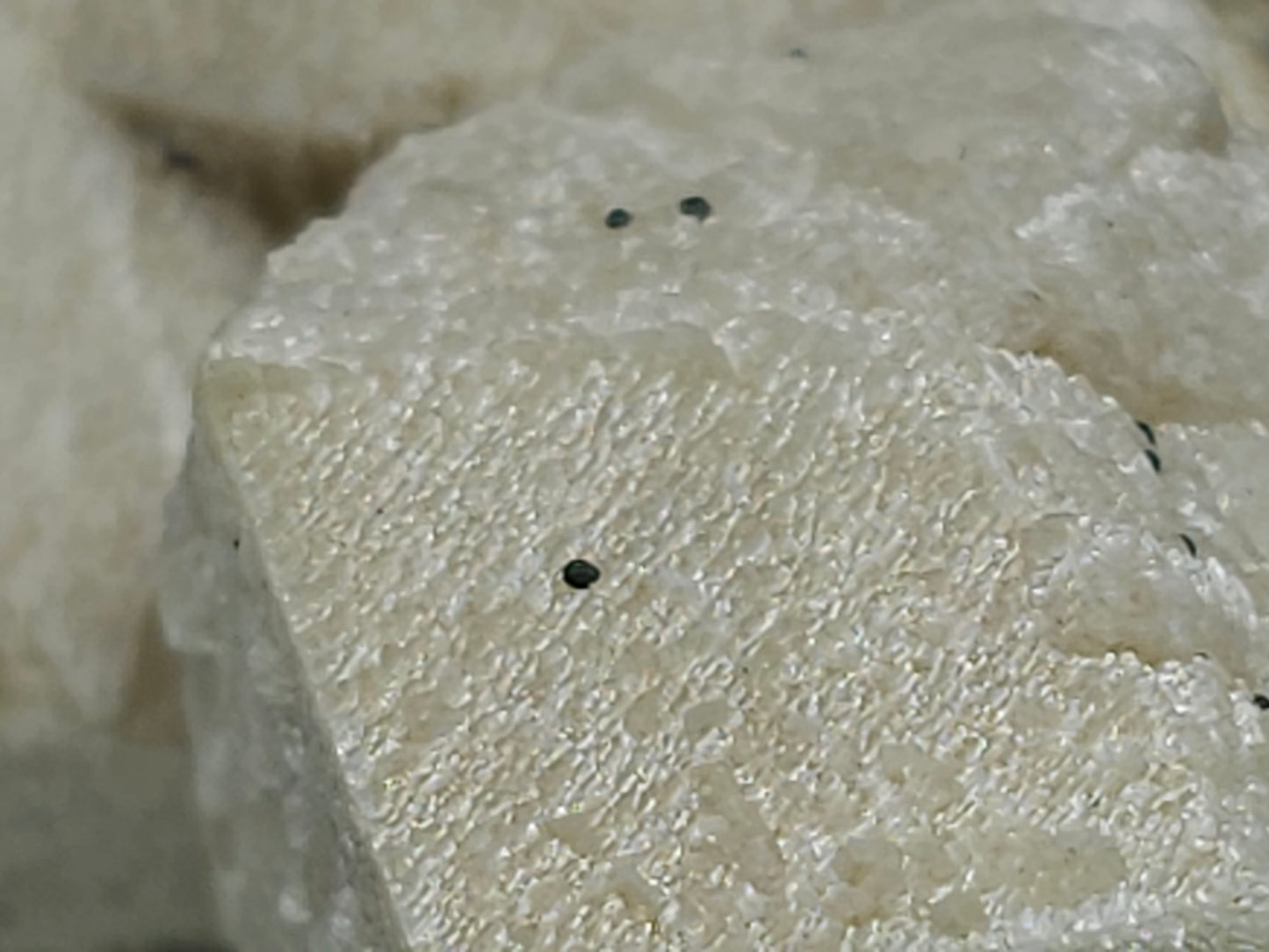 #88024 Hematite on cream-white Calcite pseudomorph after triple Combined form Calcite