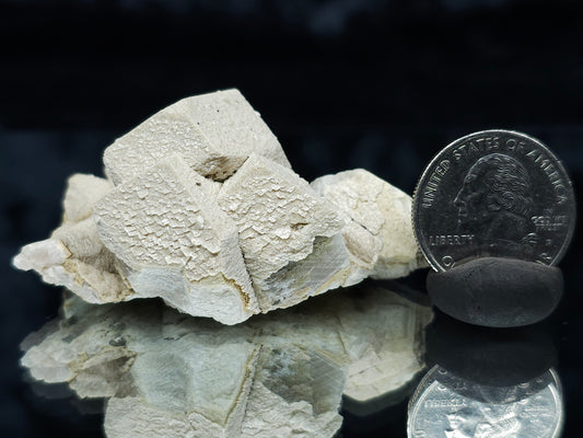 #88025 Hematite on cream-white Calcite pseudomorph after triple Combined form Calcite