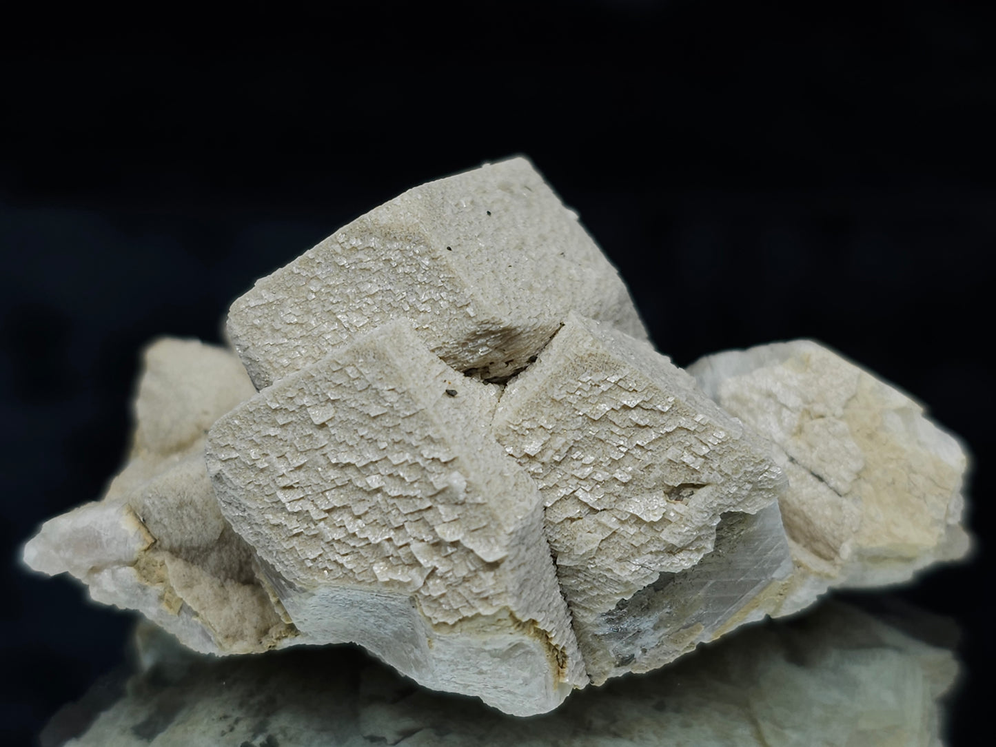 #88025 Hematite on cream-white Calcite pseudomorph after triple Combined form Calcite