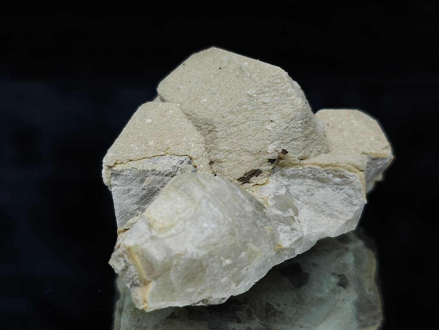 #88025 Hematite on cream-white Calcite pseudomorph after triple Combined form Calcite