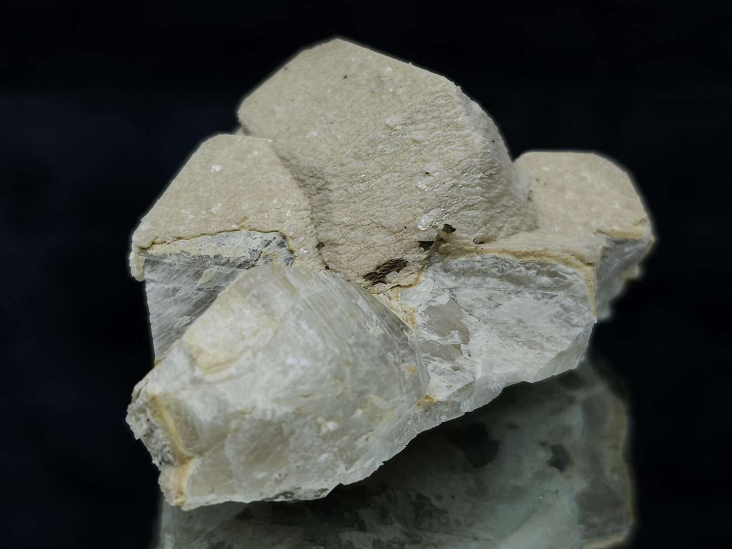 #88025 Hematite on cream-white Calcite pseudomorph after triple Combined form Calcite
