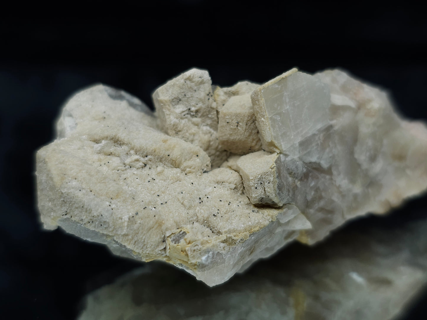 #88029 Hematite on cream-white Calcite pseudomorph after Combined form Calcite on matrix