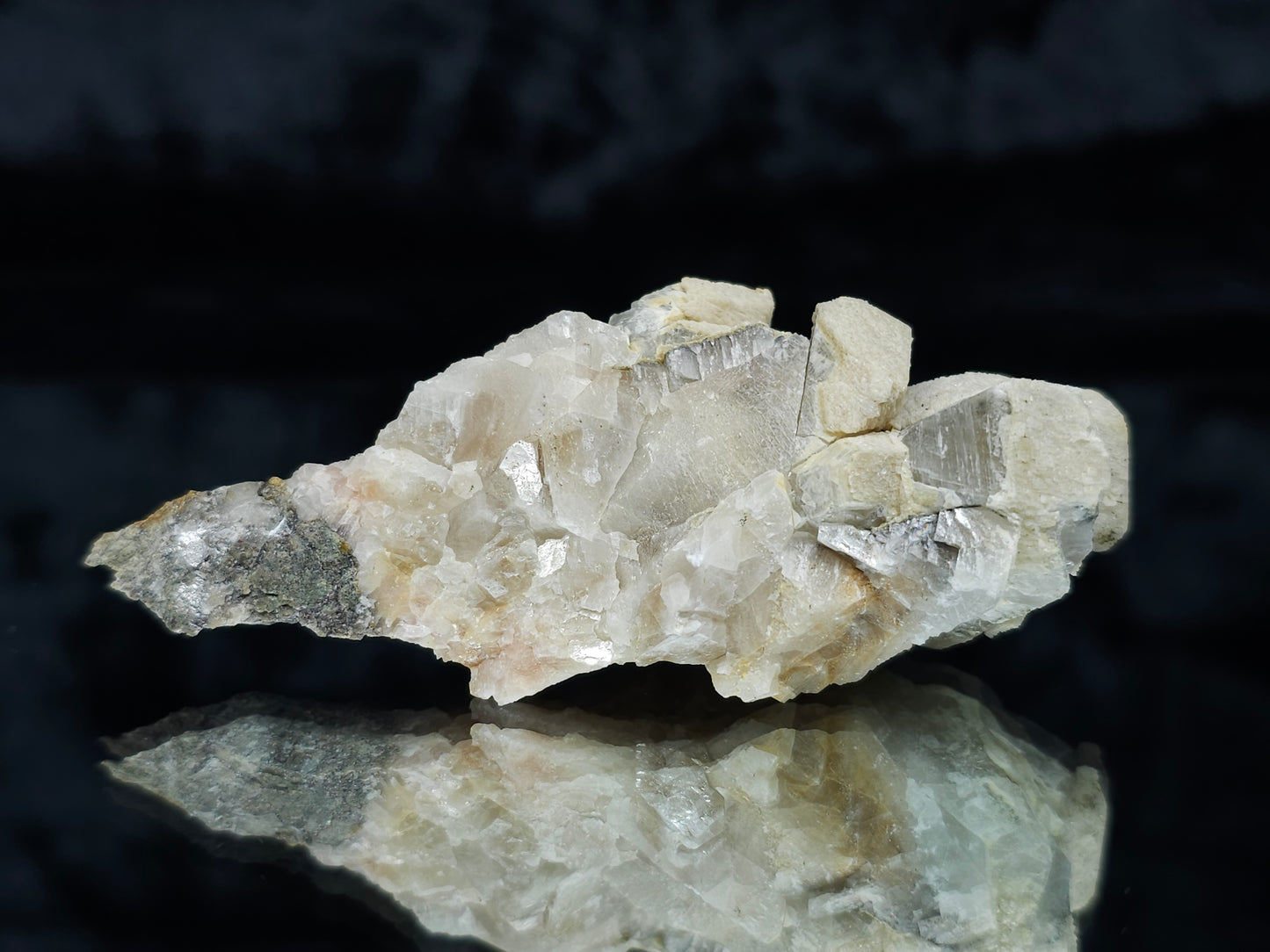 #88029 Hematite on cream-white Calcite pseudomorph after Combined form Calcite on matrix