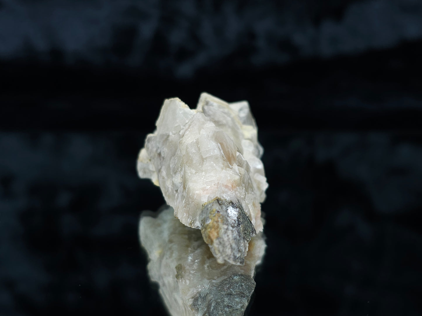 #88029 Hematite on cream-white Calcite pseudomorph after Combined form Calcite on matrix