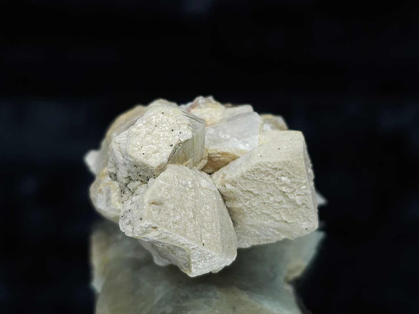 #88031 Hematite on cream-white Calcite pseudomorph after Combined form Calcite