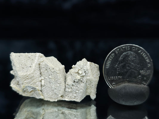 #88032 Hematite on cream-white Calcite pseudomorph after triple Combined form Calcite