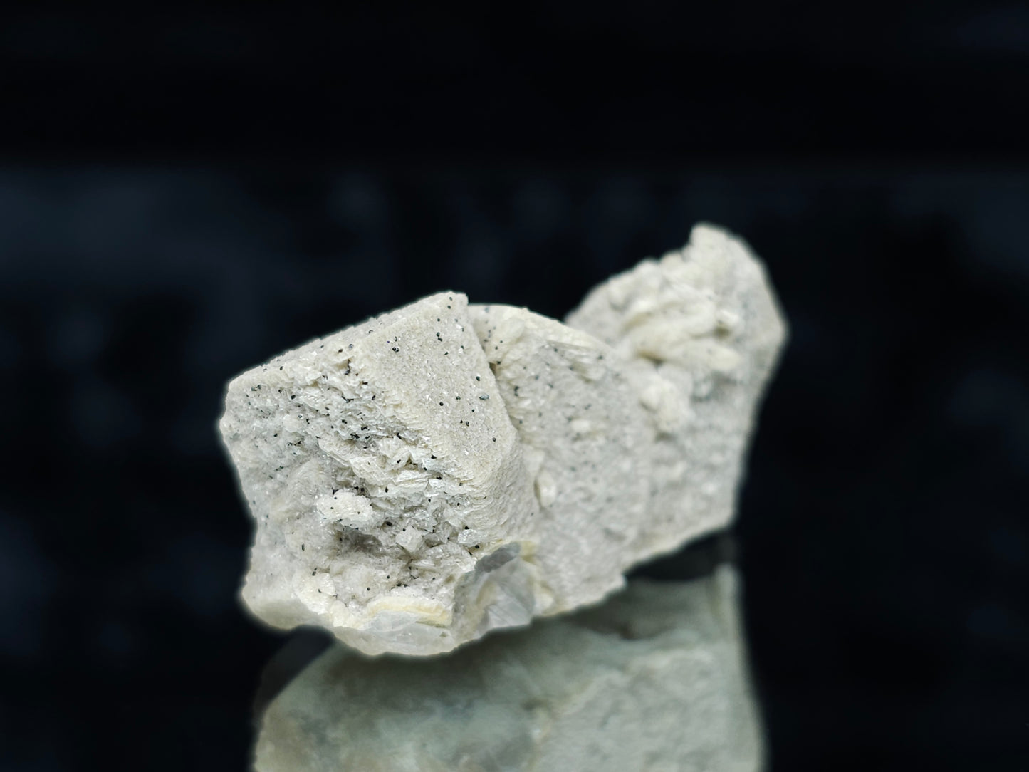 #88032 Hematite on cream-white Calcite pseudomorph after triple Combined form Calcite