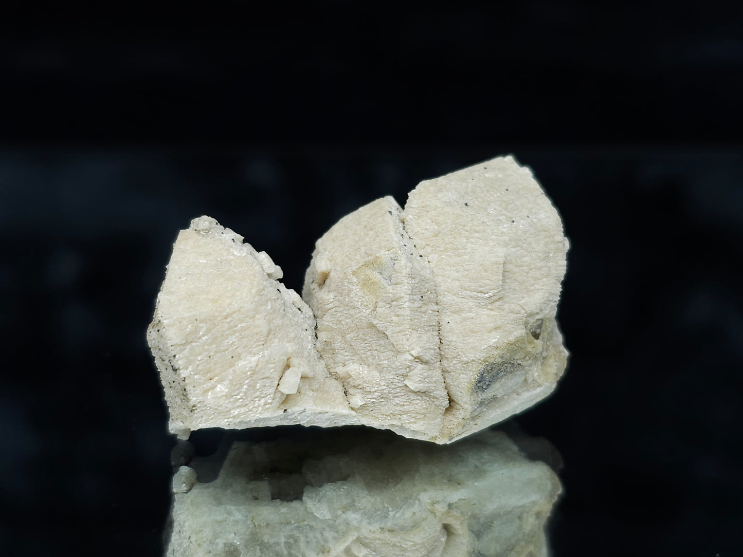 #88032 Hematite on cream-white Calcite pseudomorph after triple Combined form Calcite