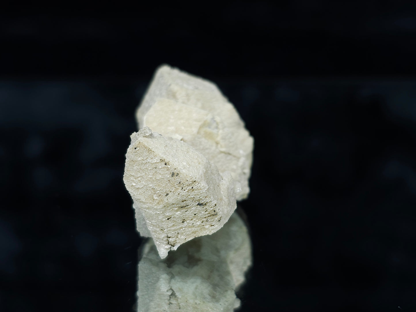 #88032 Hematite on cream-white Calcite pseudomorph after triple Combined form Calcite